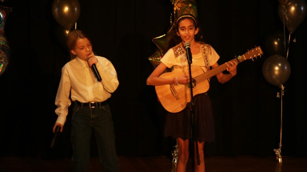 Students perform in the middle school talent show