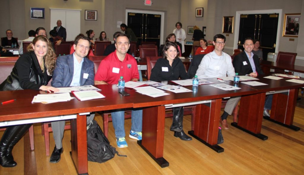 Students present the Local Action Project to an alumni panel