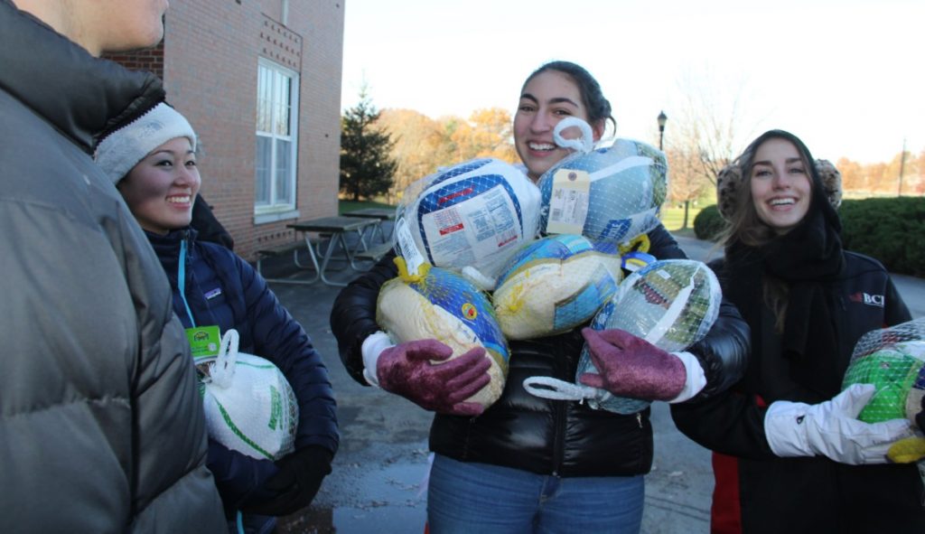 Students deliver turkeys along the Turkey Train