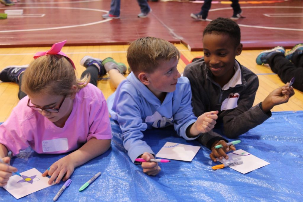 Students participate in Commuty Day activities