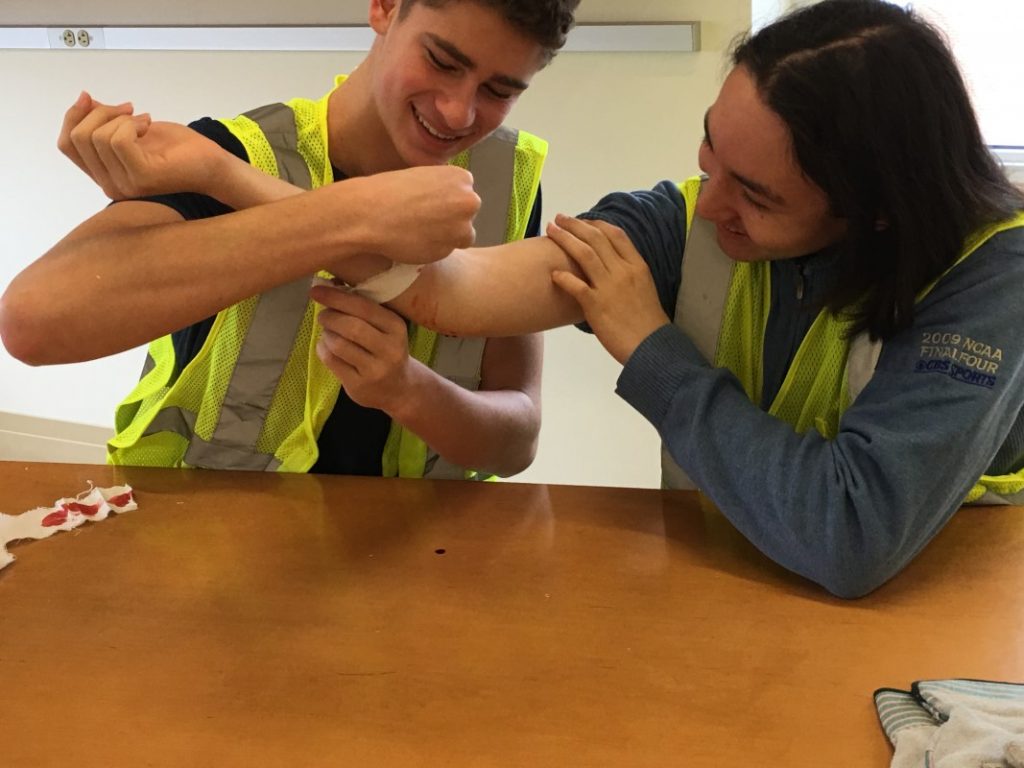 Students practice making tourniquets for Teen CERT
