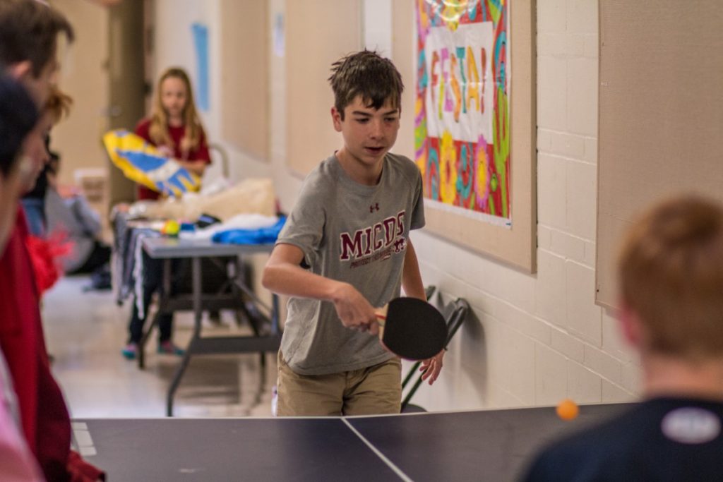 Students playing ping pong at Spring Fling