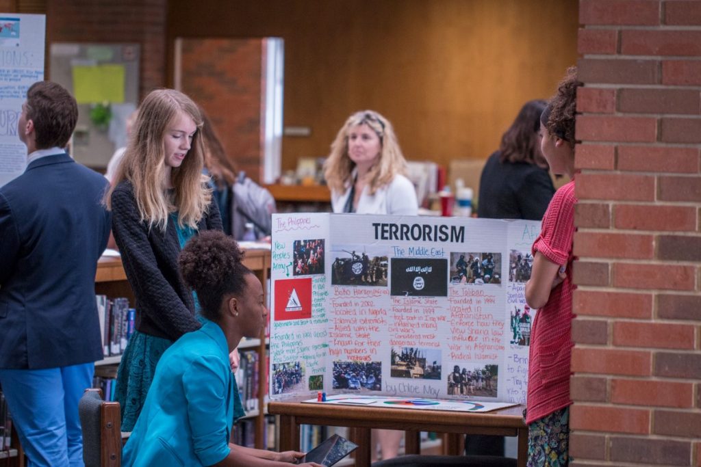 A student's project on terrorism is presented at the global issues museum
