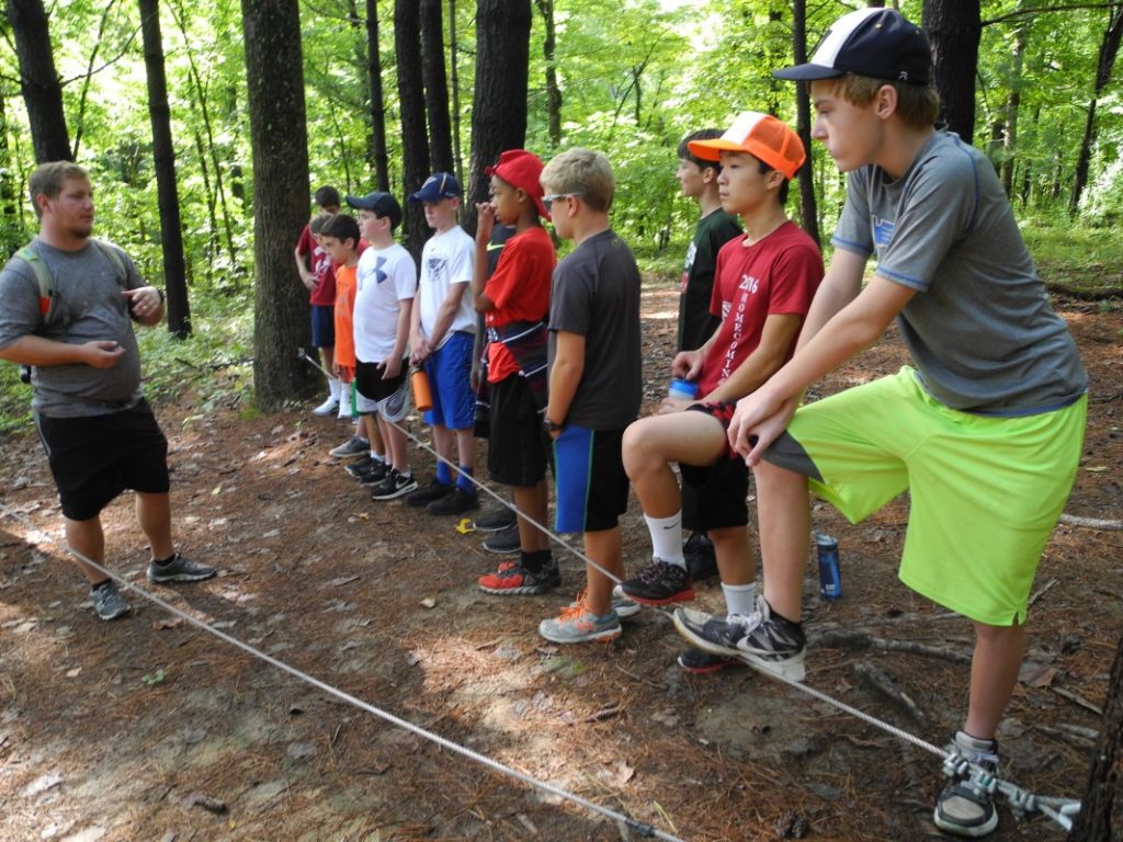 Students prepare to take part in the rope balance challenge