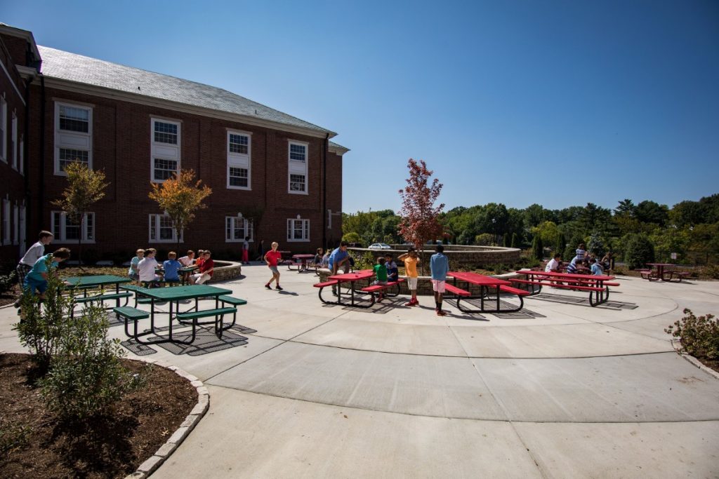Middle school students gather in the new courtyard