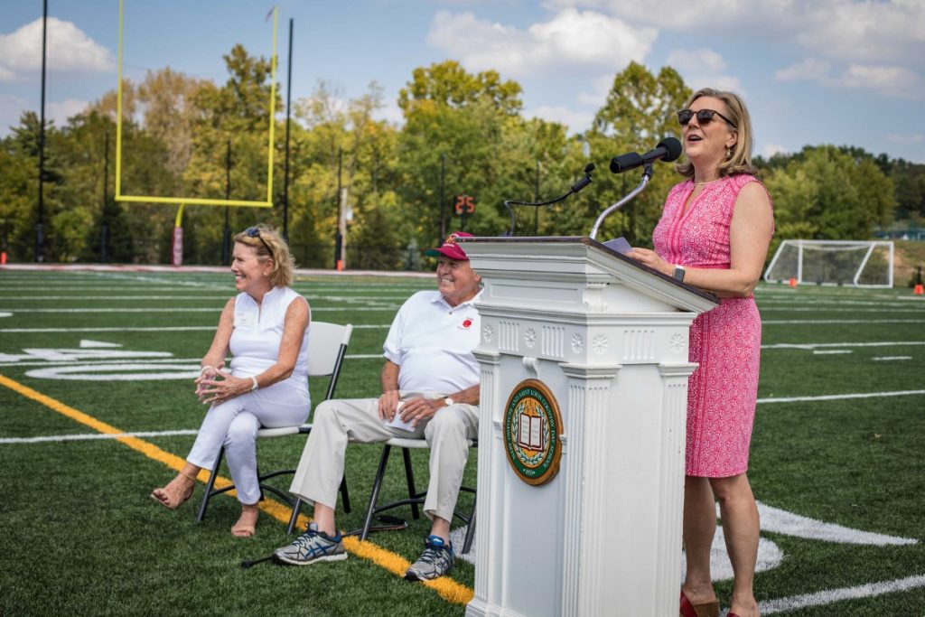 Lisa Lyle speaking at Coach Holtman Stadium Dedication