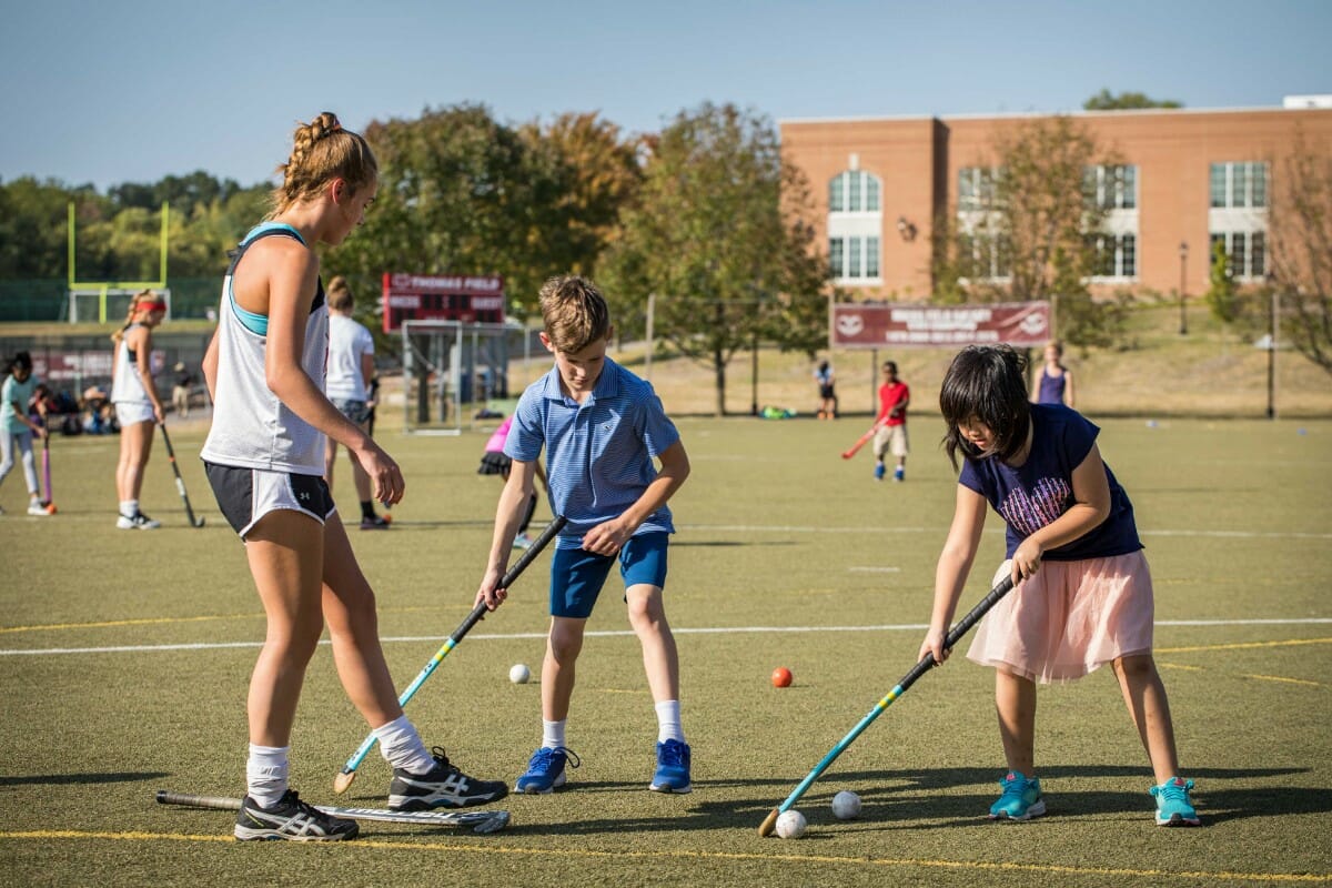 The Field Hockey varsity team teaches the lower schoolers