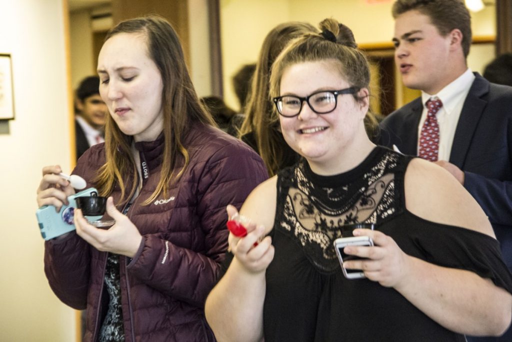 Students try out the ice cream after Dr. Maya Warren gives the Bond Lecture