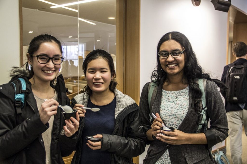 Students try out the ice cream after Dr. Maya Warren gives the Bond Lecture