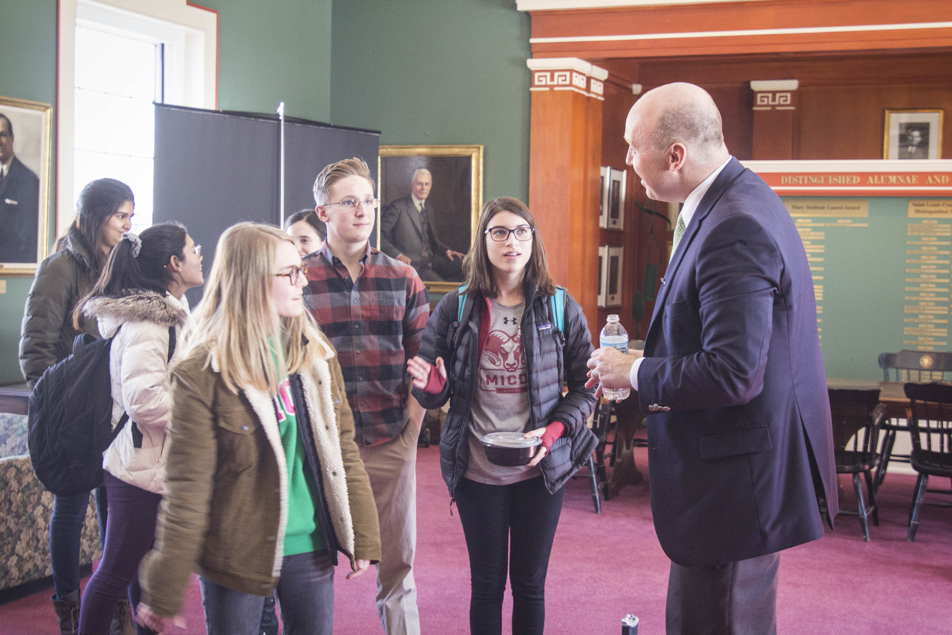 Jay Rainey visits with Upper School students.