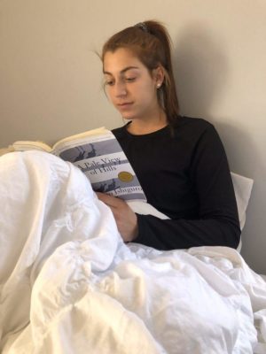 Lauren Mishkin reads at home